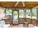 Cozy screened porch featuring a ceiling fan and a view to the green yard at 3199 Harmony Rd, Catawba, SC 29704