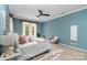 Serene bedroom with carpet, ceiling fan, lots of natural light, and calming blue walls at 418 Garnet Ct, Fort Mill, SC 29708