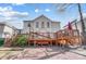 This house features a spacious wooden deck, perfect for outdoor entertaining and relaxing on a sunny day at 4427 Brandie Glen Rd, Charlotte, NC 28269