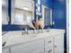 Bathroom with dual sinks, modern fixtures, and updated vanity at 4427 Brandie Glen Rd, Charlotte, NC 28269