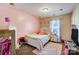 Cozy bedroom with bright décor and a fun, colorful rug at 4427 Brandie Glen Rd, Charlotte, NC 28269
