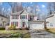 Charming two-story home with white siding, red shutters, and a well-maintained front yard at 4427 Brandie Glen Rd, Charlotte, NC 28269