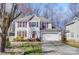 Well-maintained two-story home features a two car garage and charming front yard landscaping at 4427 Brandie Glen Rd, Charlotte, NC 28269