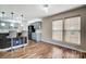 Charming kitchen featuring gray cabinets, stainless appliances, and barstool seating at 4427 Brandie Glen Rd, Charlotte, NC 28269