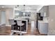 Kitchen featuring modern appliances, barstool seating, and decorative lighting at 4427 Brandie Glen Rd, Charlotte, NC 28269