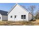 Rear exterior of new construction home showcasing clean lines and modern design at 4903 Victoria Ave, Charlotte, NC 28269