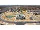 Stunning aerial view of community amenities including tennis courts, pool, playground, and clubhouse at 491 Creevy Nw Dr, Concord, NC 28027