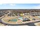 Beautiful community view featuring a pool, clubhouse, tennis courts, playground, and well-maintained landscaping at 491 Creevy Nw Dr, Concord, NC 28027