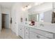 Bright bathroom showcasing a double sink vanity, neutral paint, and tile flooring at 491 Creevy Nw Dr, Concord, NC 28027