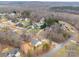 Overhead view of a residential neighborhood with well-maintained homes and mature trees at 5101 Thornhill Dr, Gastonia, NC 28052