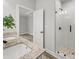 Granite countertop bathroom boasts a glass enclosed shower and elegant fixtures, for modern comfort at 5101 Thornhill Dr, Gastonia, NC 28052