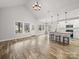 Bright and airy living space featuring high ceilings, wood floors, and views to the back porch at 5101 Thornhill Dr, Gastonia, NC 28052