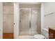Modern bathroom with a glass-enclosed shower, tiled walls, and a clean, well-lit space at 525 E Sixth St # 208, Charlotte, NC 28202