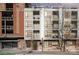Modern condo building with large windows and balconies, offering city views and contemporary design at 525 E Sixth St # 208, Charlotte, NC 28202