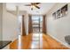 Bright living room with hardwood floors and a large window offering natural light at 525 E Sixth St # 208, Charlotte, NC 28202