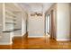 A bright living room has hardwood floors and natural light from a sliding glass door at 525 E Sixth St # 208, Charlotte, NC 28202