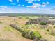 Aerial view of the property and surrounding farmland at 5405 Austin Rd, Monroe, NC 28112