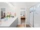 Bright bathroom boasts double sinks, gray cabinetry, and a modern glass-enclosed shower at 5405 Austin Rd, Monroe, NC 28112