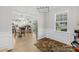 Open-concept dining area with backyard view and access seamlessly connects with the kitchen at 5405 Austin Rd, Monroe, NC 28112