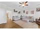 Elegant living room with stylish sofas, neutral decor, and hardwood floors, creating a sophisticated and inviting space at 5405 Austin Rd, Monroe, NC 28112