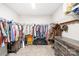 Spacious walk-in closet with ample storage, shelving, and wooden dresser provides organized convenience at 5405 Austin Rd, Monroe, NC 28112