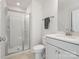 Cozy bathroom with a modern sink, vanity, and a glass-enclosed shower at 5585 Zeeland Ln, Fort Mill, SC 29707