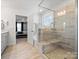 Modern bathroom with a shower and tub at 5585 Zeeland Ln, Fort Mill, SC 29707