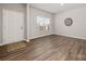 Bright living room with hardwood floors, neutral paint, and plenty of natural light at 6015 Ahoskie Dr, Charlotte, NC 28215