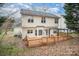 Back exterior showcasing a home with a deck and access to a nice backyard at 6027 Edinmeadow Ln # 29, Charlotte, NC 28269
