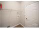 Laundry room featuring shelving above the washer and dryer hookups at 6027 Edinmeadow Ln # 29, Charlotte, NC 28269