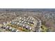 Expansive aerial view of a well-planned residential community, showcasing a harmonious blend of homes and greenery at 7003 Dacian Ln, Indian Trail, NC 28079