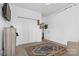 Clean bedroom with a large closet, modern carpet and a stylish rug at 7003 Dacian Ln, Indian Trail, NC 28079
