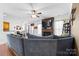 Bright living room with a fireplace, TV and a large sectional couch at 7003 Dacian Ln, Indian Trail, NC 28079