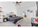 Spacious main bedroom featuring a large bed and an attached bathroom at 7003 Dacian Ln, Indian Trail, NC 28079