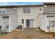 Backyard patio with sliding door access, a small yard and privacy fencing at 725 Rock Lake Gln, Fort Mill, SC 29715