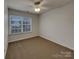 Bright bedroom with carpet flooring and a ceiling fan at 725 Rock Lake Gln, Fort Mill, SC 29715