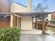 Charming two-story home featuring a covered front porch, and mature landscaping at 7340 Winery Ln, Charlotte, NC 28227