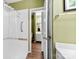 Bathroom showcasing a shower with white tile, and a glimpse into the vanity area at 766 Marsh Rd # Apt 2, Charlotte, NC 28209