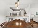 Bright dining area featuring pendant lighting and a view of the kitchen with stainless steel appliances at 766 Marsh Rd # Apt 2, Charlotte, NC 28209