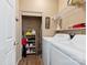 Bright laundry room boasts a modern washer and dryer, plus organized shelving and storage for convenience at 766 Marsh Rd # Apt 2, Charlotte, NC 28209