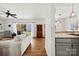 Comfortable living room with hardwood floors, slider to deck, and view of kitchen at 766 Marsh Rd # Apt 2, Charlotte, NC 28209