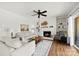 Inviting living room with a fireplace, built-in shelving, and contemporary decor at 766 Marsh Rd # Apt 2, Charlotte, NC 28209