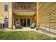 Patio with cozy seating and a hanging egg chair, perfect for relaxing outside with lawn view at 766 Marsh Rd # Apt 2, Charlotte, NC 28209