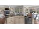 Granite countertops and stainless steel dishwasher in an open kitchen layout at 805 Hidden Pond Ln, Waxhaw, NC 28173