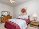 Cozy bedroom with plush carpeting, ceiling fan and a window providing natural light at 841 Platinum Dr, Fort Mill, SC 29708