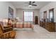 Spacious bedroom with a ceiling fan, large window and furniture at 841 Platinum Dr, Fort Mill, SC 29708