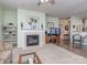 Living room with fireplace and view into kitchen and dining areas at 841 Platinum Dr, Fort Mill, SC 29708