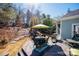 Outdoor deck area complete with a dining table and a grill, perfect for entertaining at 875 Stratford Run Dr, Fort Mill, SC 29708