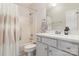Bright bathroom featuring a tub/shower combo and a sleek vanity at 875 Stratford Run Dr, Fort Mill, SC 29708