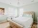 Cozy bedroom with a tufted headboard bed, and soft mint walls at 875 Stratford Run Dr, Fort Mill, SC 29708
